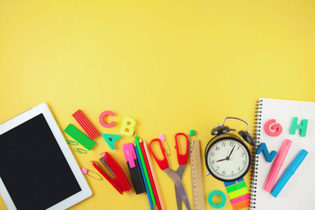 Back to school Accessories for school on a yellow background Pencils Plasticine letters Letters...
