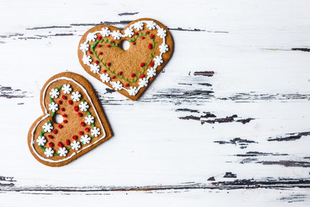 Gingerbread Cookies Hearts on a white wooden background Valentines Day concept Love Top view Copy...