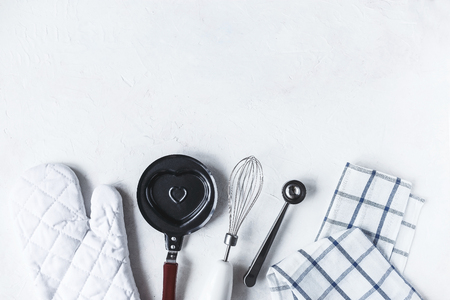 dishes and kitchen accessories for baking on the Kitchen table on a white background Copy spaceの写真素材