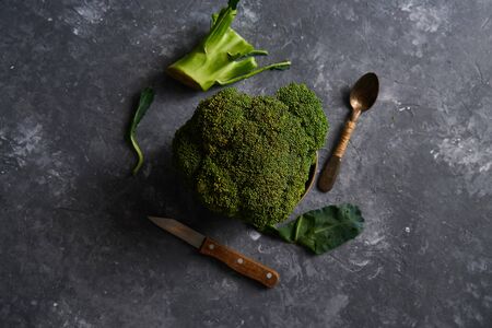 Organic broccoli on a plate on a dark background Copy space Top viewの写真素材