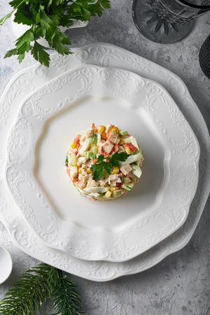 crab stick salad served in white plate on gray stone table Healthy seafoodの写真素材