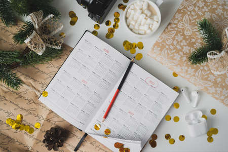 Flat lay calendar Workplace for traveler Top view of work deskの写真素材