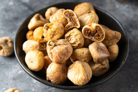 Delicious dried figs in a bowl. Healthy snackの写真素材
