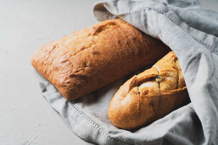 Freshly baked homemade bread with crispy crust and garlicの写真素材
