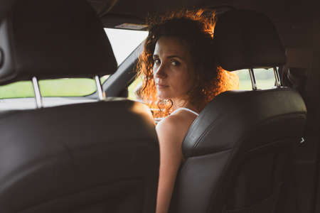 Young woman travelers are photographed on a smartphone in natureの写真素材