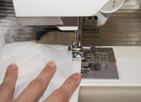 sewing machine in workの写真素材