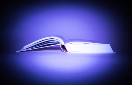 Opens book on blue background