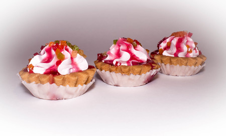 three cupcakes on white backgroundの写真素材