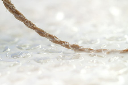 Wet light bubble surface with diagonal rope