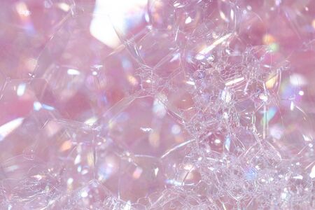 Pink shiny bubbles for unusual bright cool macro wallpaperの写真素材