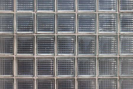 Solid square shabby similar equal old glass blocks texture for macro wallpaper or backgroundの写真素材