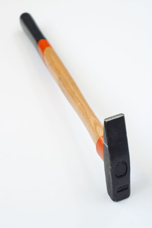 Hammer with striped handle isolated clean white background