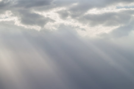 Sun lights through sky clouds for peaceful spiritual shiny wallpaper