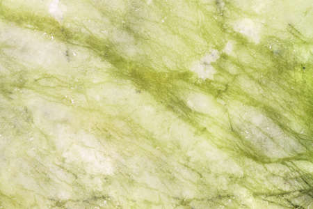 Marble stone surface with green color veins pattern for macro wallpaper or backgroundの写真素材