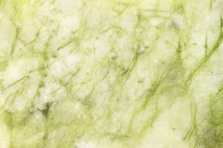 Green light natural marble stone surface with veins for macro wallpaper or backgroundの写真素材