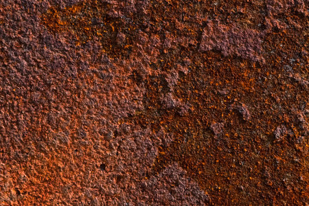 Very rusty unpainted metal surface red iron industry grunge texture pattern macro