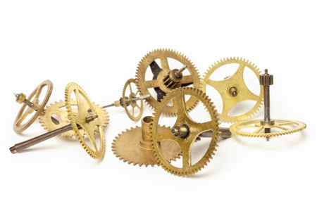 Several steampunk golden copper bronze different mechanic retro steel parts cogwheels isolated on...