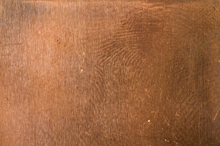 Rusty golden shabby weathered copper old industrial surface for grunge wallpaper or backgroundの写真素材