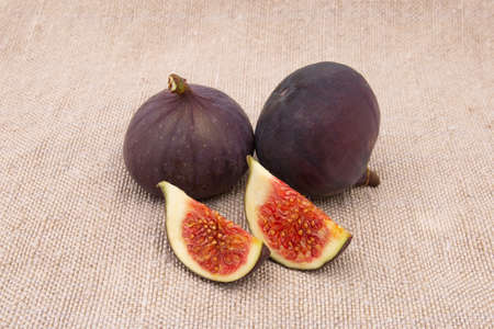fresh juicy figs on burlapの写真素材
