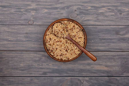 Energy granola with honey on a wooden background.の写真素材
