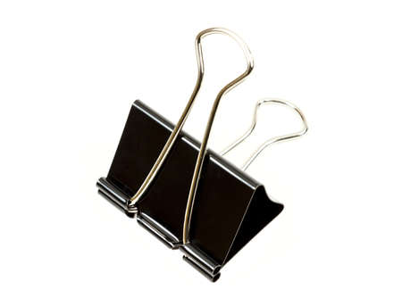 Black paper clip isolated on white backgroundの写真素材