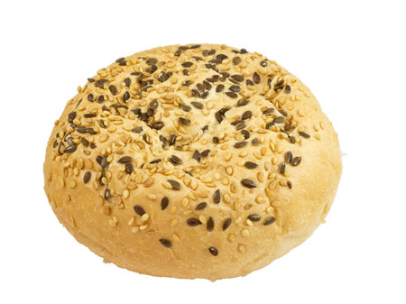 bun with sesame seeds and flax isolated on white background
