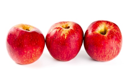 three red apple isolated on white backgroundの写真素材