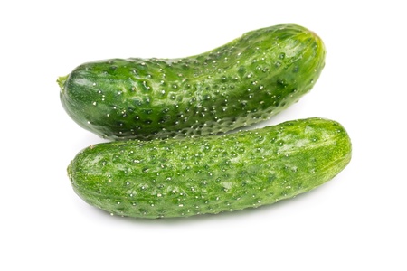 Two fresh cucumbers isolated on white backgroundの写真素材