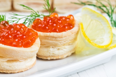 Tartlets with red caviar and curd cheeseの写真素材
