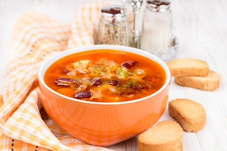 Soup with meatballs, red beans and carrotsの写真素材