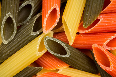 Background of colorful pasta as texture, close-up の写真素材