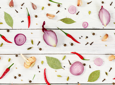 Seamless pattern with various spices on wooden background. Flat lay composition.の写真素材