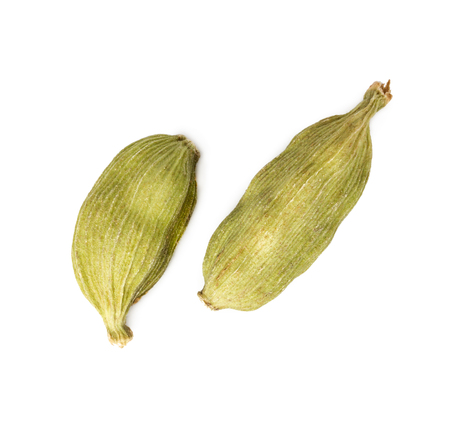 Two cardamon pods isolated on white background.の写真素材