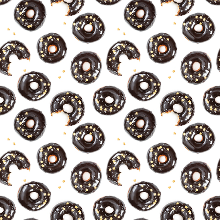 Seamless pattern with chocolate donuts isolated on white background. Top view.の写真素材