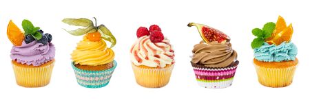 Set of different cupcakes isolated on white background.の写真素材
