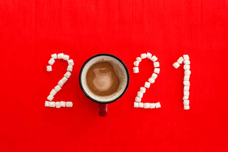 New Years coffee 2021 with a mug of coffeeの写真素材
