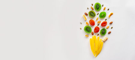 Composition of multicolored candied fruit on a white background. View from above. A place for text....