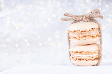 Sweet Macarons on Christmas Background with Copy Spaceの写真素材