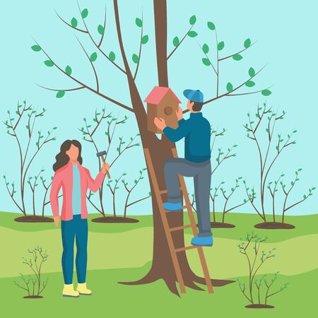 A young man and woman hang a birdhouse on a tree. The concept of volunteers, working in the garden, taking care of nature. Flat cartoon vector illustration.のイラスト素材