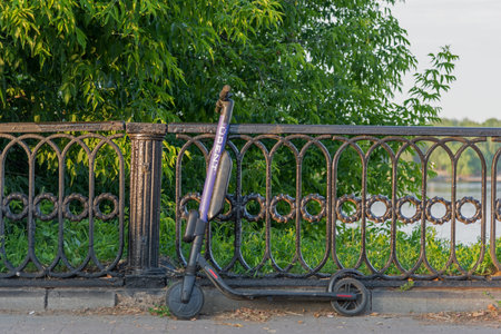 RUSSIA, YAROSLAVL - July 06, 2022. Electric scooters are parked on the embankment of the Volga River, parkingのeditorial素材