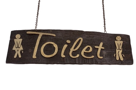 Toilet wood signboard isolated on white and clipping pathの写真素材