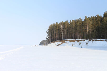 Part of the island in snow against the skyの写真素材