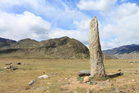 Antiquity monument among mountains against the skyの写真素材