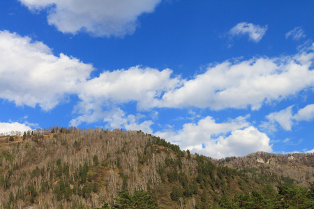 Mountains against the sky and cloudsの写真素材