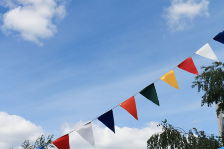 Multi-colored tags against the skyの写真素材