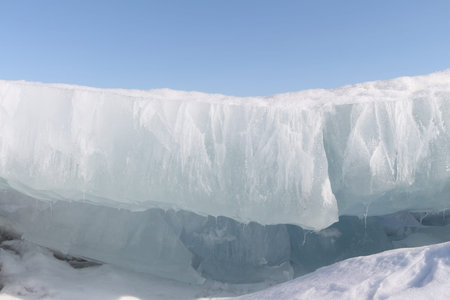 Fragment of an ice block on the river in the spring