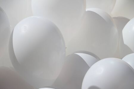 Gray balloons on threadsの写真素材