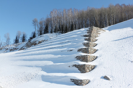 Protection of the mountain highway against rocky talusesの写真素材