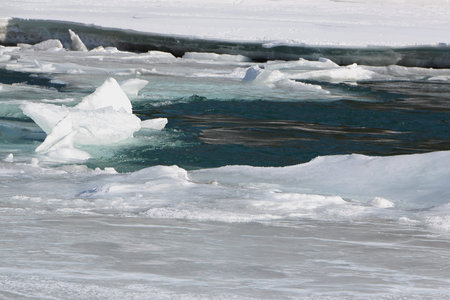 Ice melting on the river in the spring, Katun River, Altai, Russia