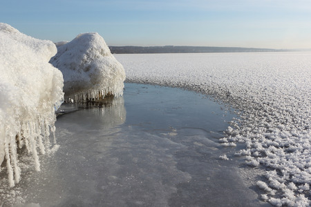 Formation of ice on the river in the fall at sunset, Ob Reservoir, Siberia, Russiaの写真素材